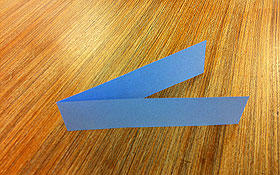 A strip of paper folded into halves.